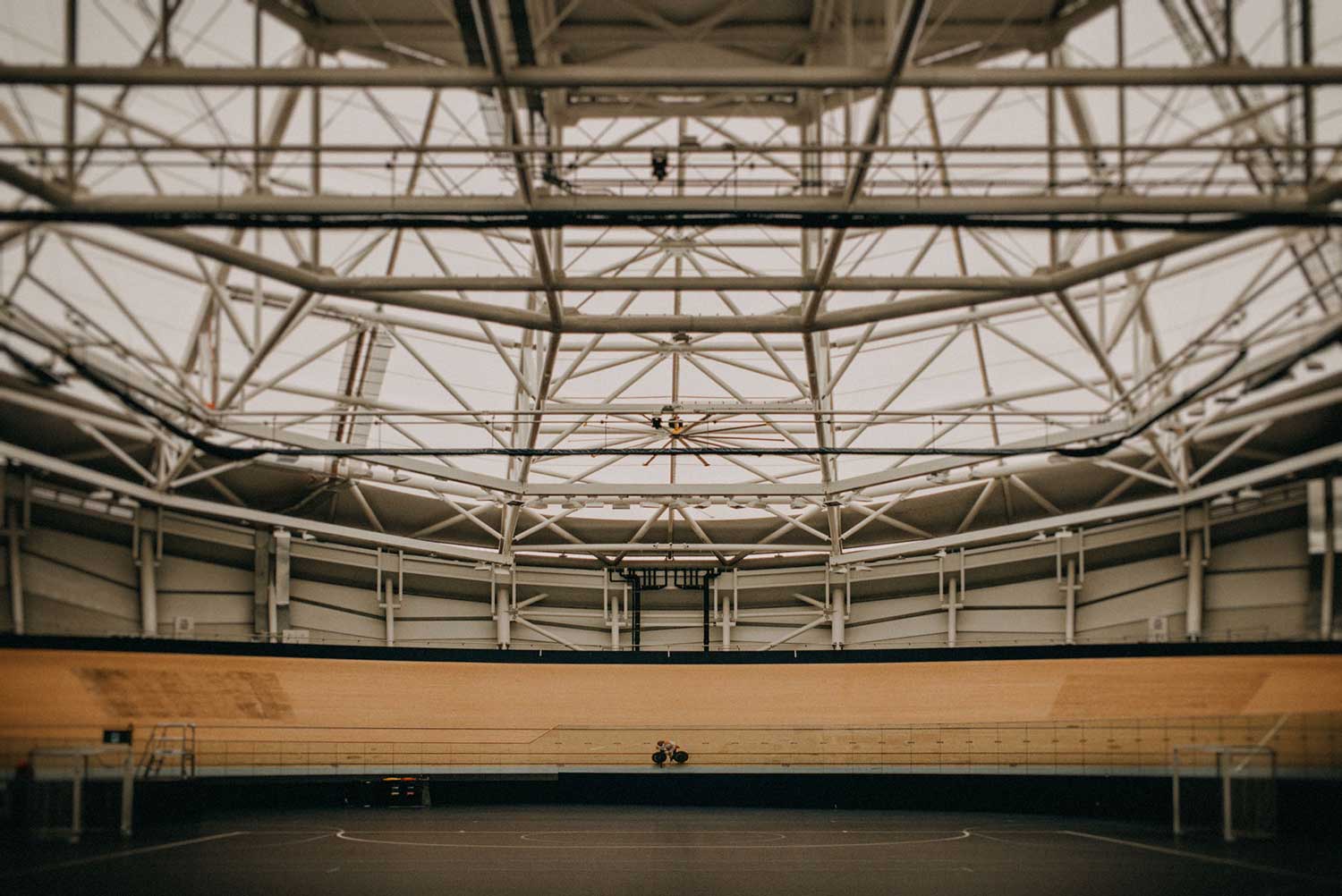 Japanese cyclist trains alone in the indoor velodrome
